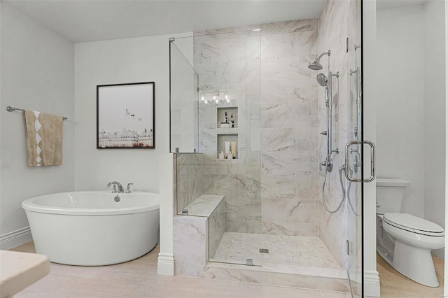 bathroom featuring tile flooring, toilet, and plus walk in shower