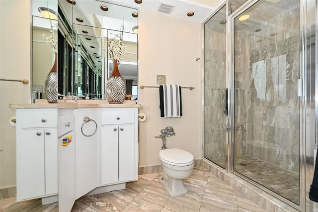 bathroom with vanity, toilet, and walk in shower