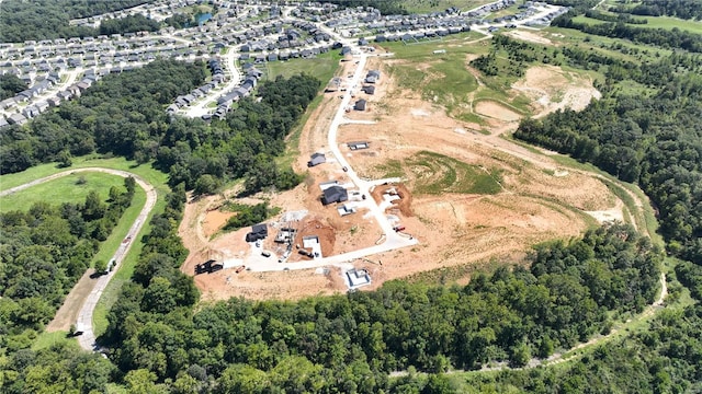 aerial view featuring a view of trees