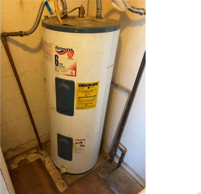 utility room with water heater