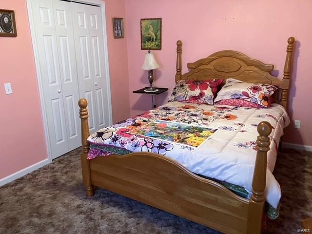 carpeted bedroom featuring a closet