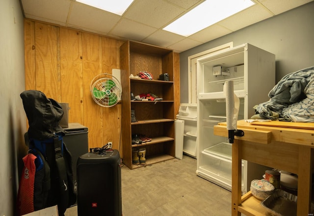 interior space featuring a drop ceiling