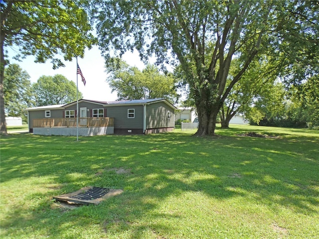 view of yard with a deck