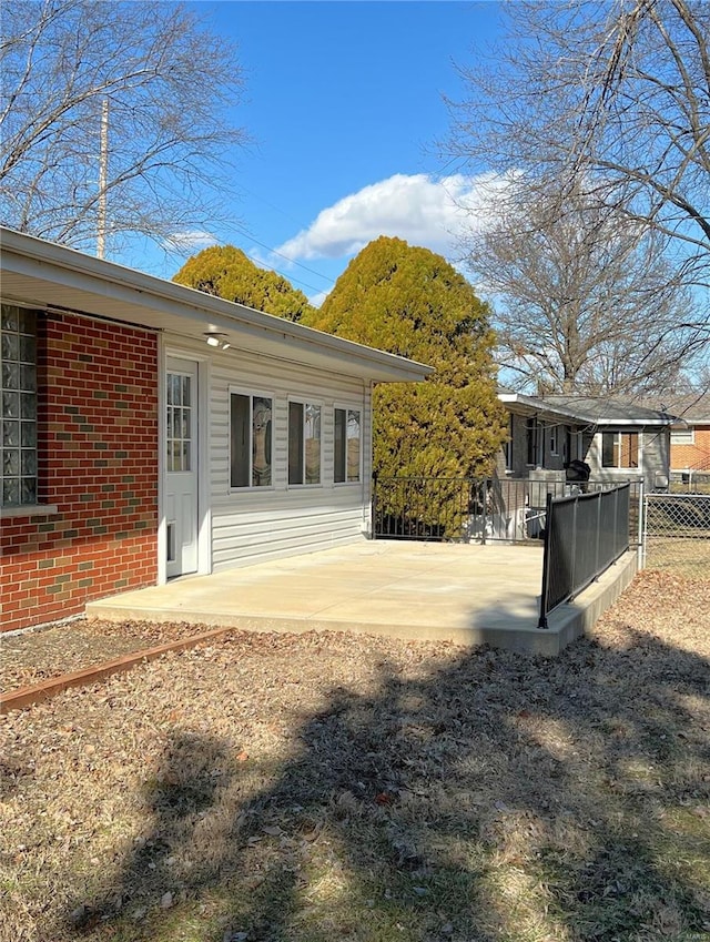 rear view of house featuring a patio area