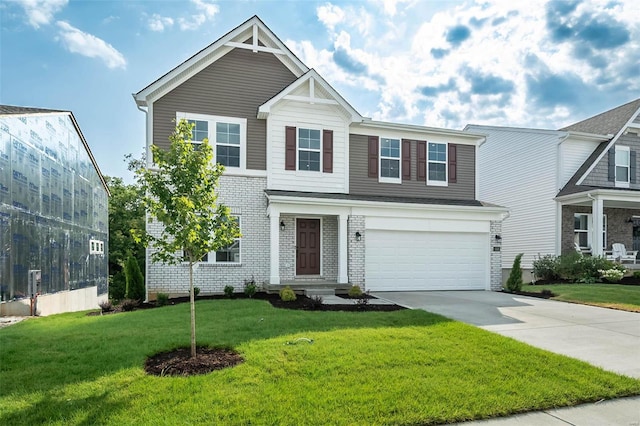 view of front of home featuring an attached garage, a front lawn, concrete driveway, and brick siding