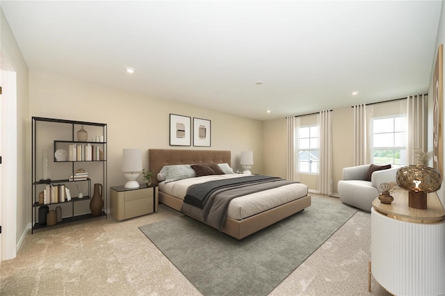 bedroom featuring recessed lighting, light carpet, and baseboards