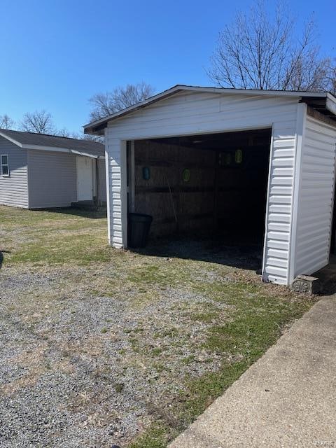 garage with a yard