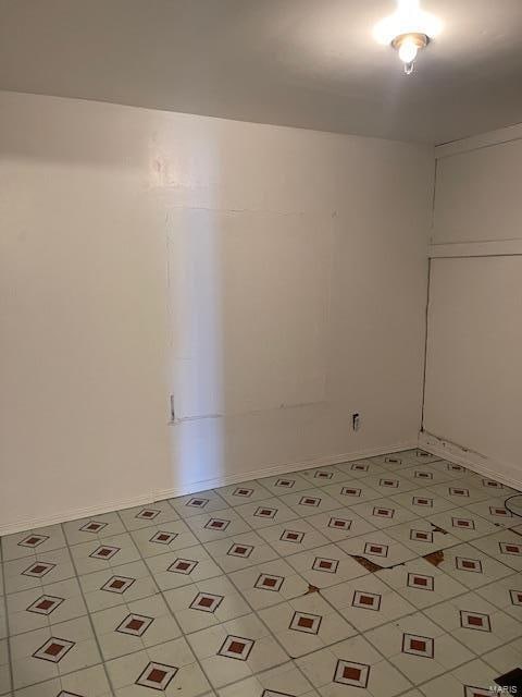 view of tiled spare room