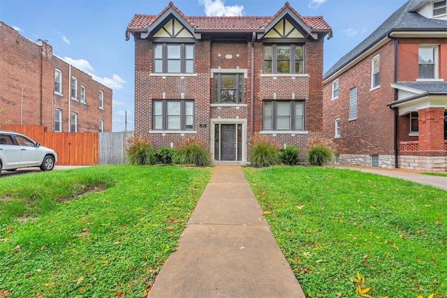 view of front of home with a front lawn