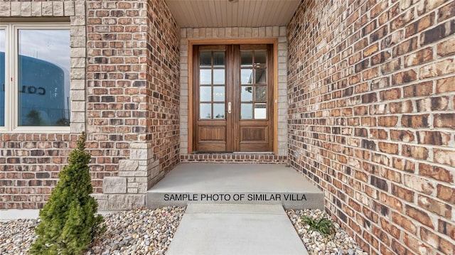 doorway to property featuring french doors