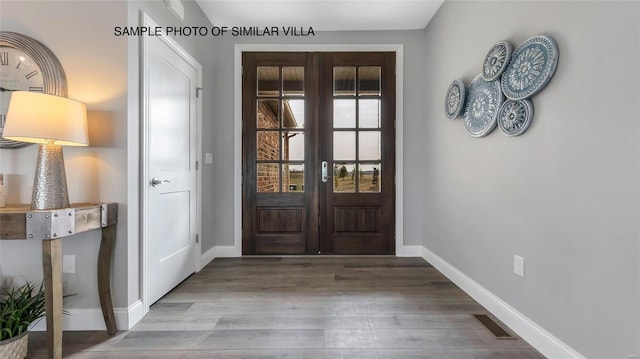 interior space with french doors and light wood-type flooring