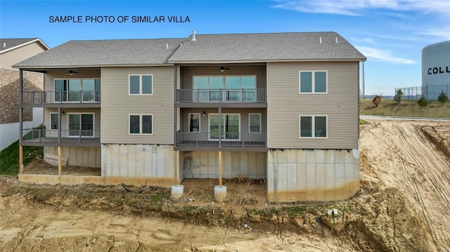 rear view of property with a balcony