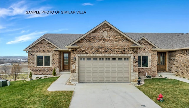 craftsman-style house with a front lawn and a garage