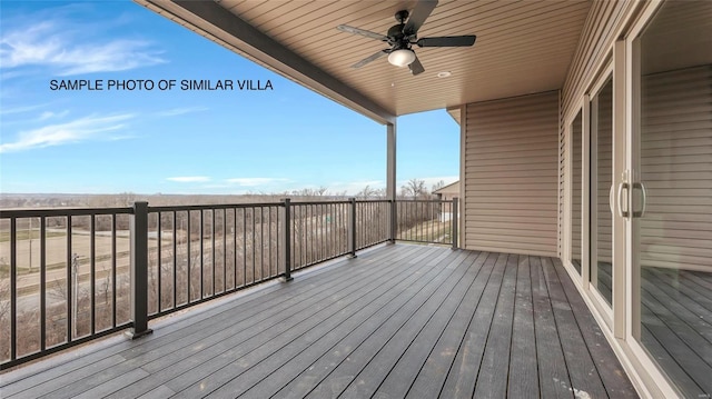 wooden deck with ceiling fan