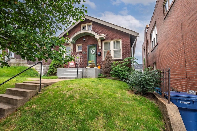 view of front facade featuring a front yard