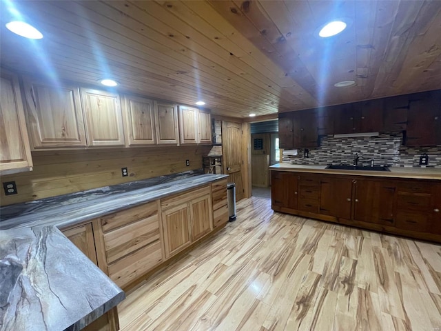 kitchen featuring sink, light hardwood / wood-style flooring, backsplash, light brown cabinets, and wooden ceiling