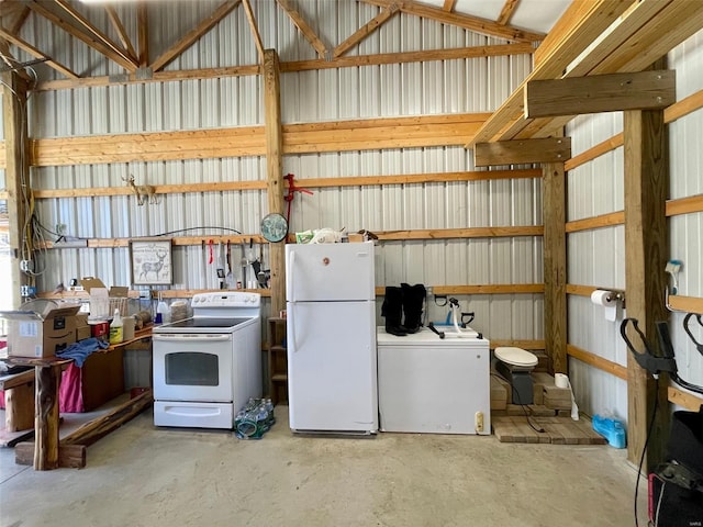 garage featuring white fridge