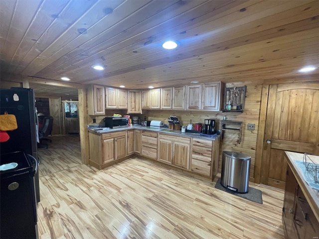 kitchen with wooden walls, light hardwood / wood-style floors, and wooden ceiling