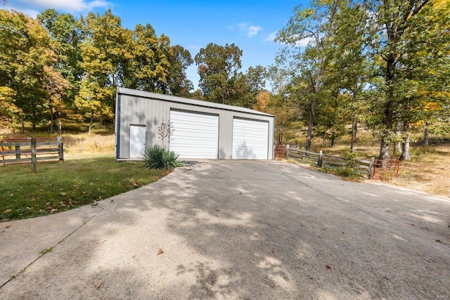 detached garage with fence