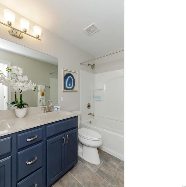 full bathroom with vanity, toilet, and shower / washtub combination