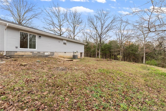 view of yard with central AC