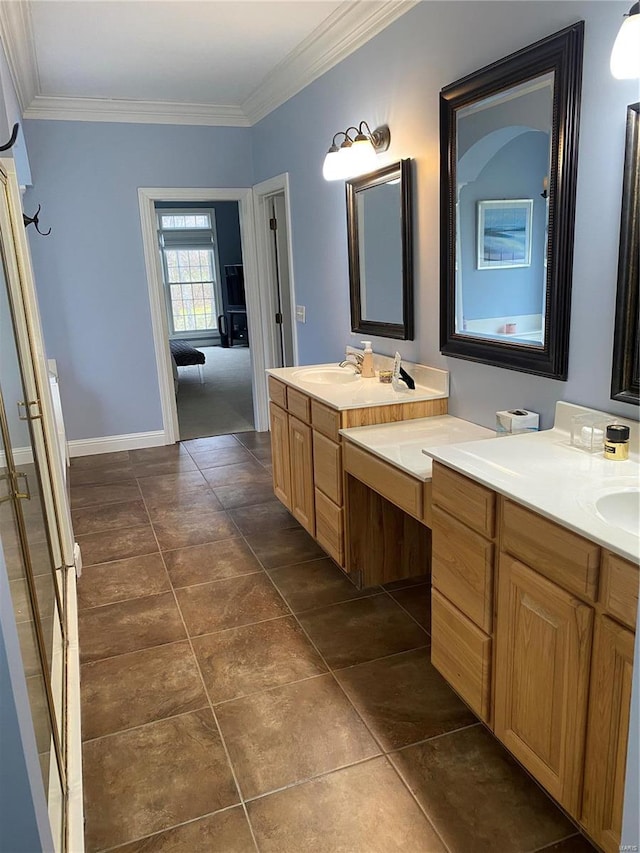 bathroom with tile floors, ornamental molding, and vanity