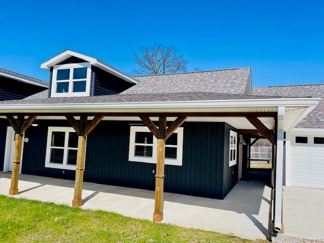 exterior space featuring a garage