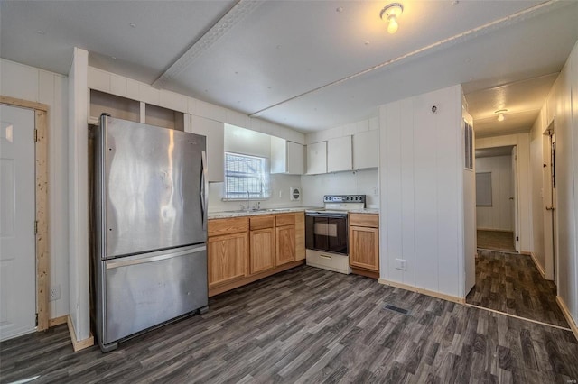 kitchen featuring stainless steel refrigerator, white range with electric stovetop, sink, and dark wood-type flooring