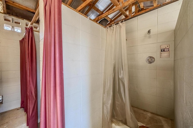 bathroom featuring walk in shower