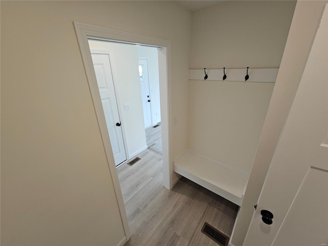 mudroom with light wood-type flooring