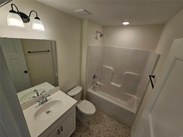 full bathroom featuring toilet, bathing tub / shower combination, and vanity