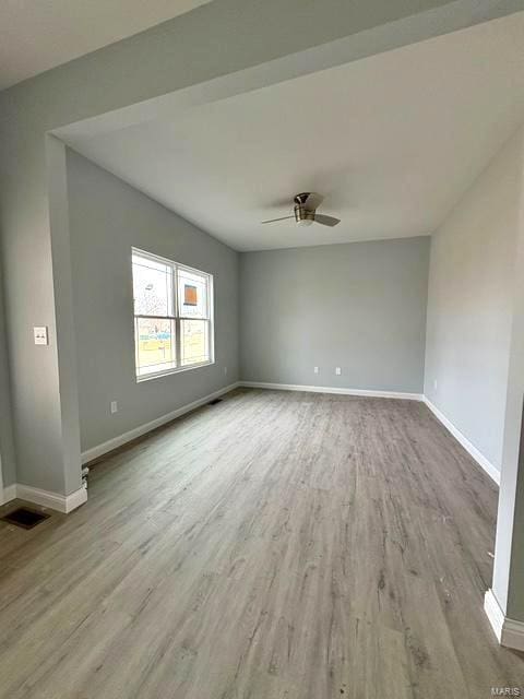 unfurnished room featuring ceiling fan and light wood-type flooring