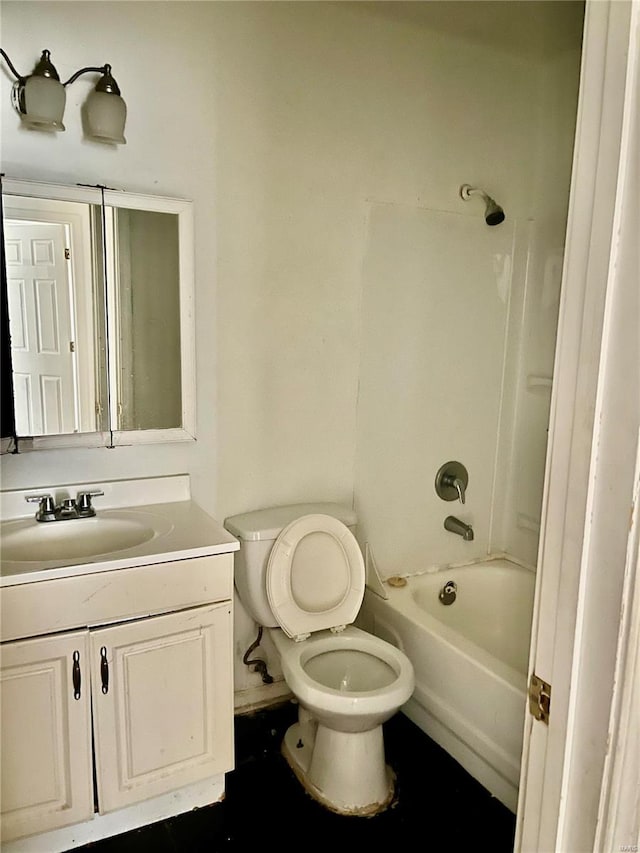 full bathroom with washtub / shower combination, toilet, and large vanity