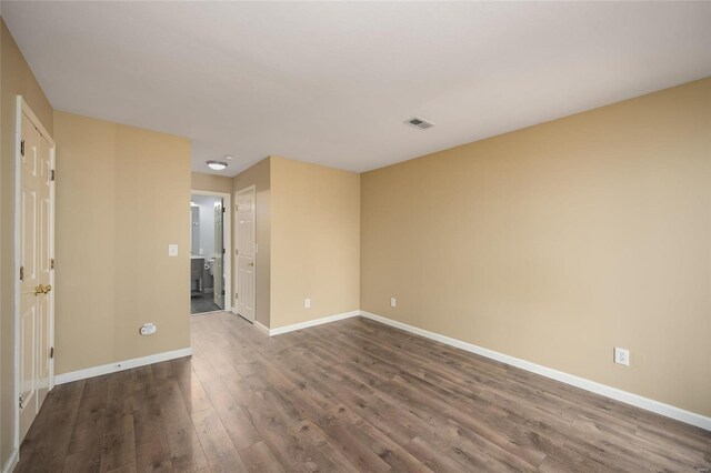 empty room featuring hardwood / wood-style floors