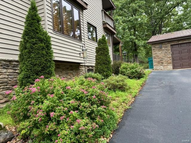 view of property exterior featuring a balcony