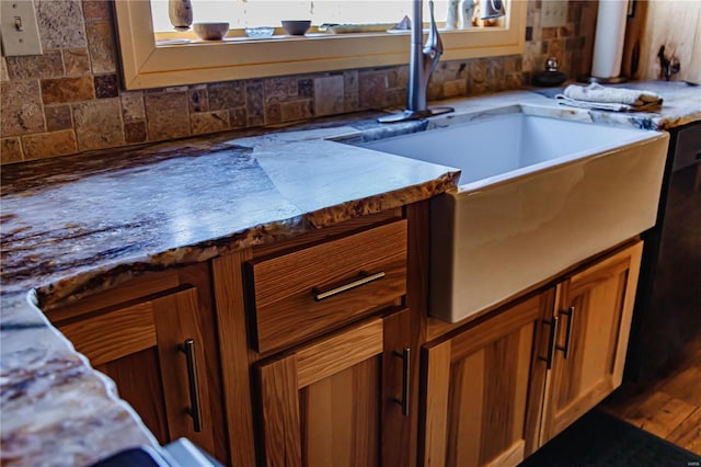 kitchen with sink and dark hardwood / wood-style floors