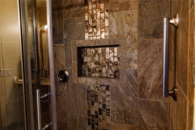 bathroom with an enclosed shower