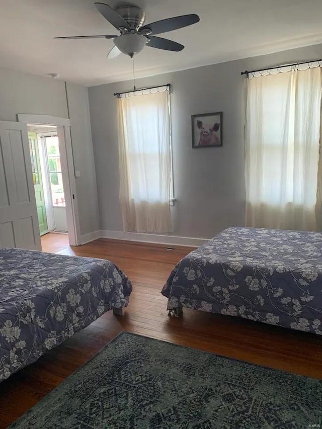 bedroom featuring ceiling fan and light wood-type flooring