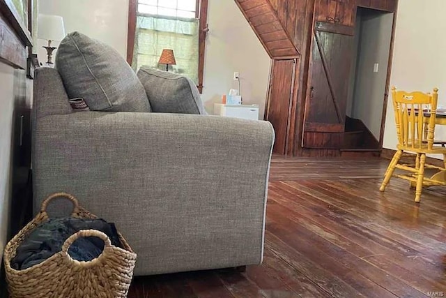 living room with dark wood-type flooring