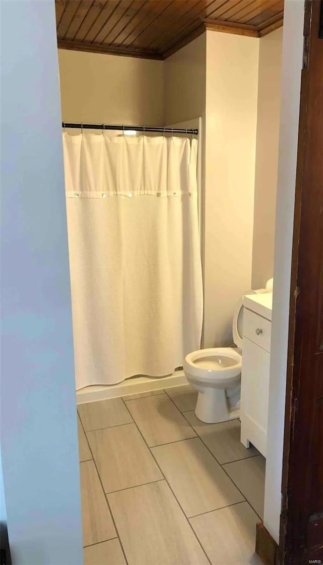 bathroom featuring vanity, wood ceiling, tile floors, and toilet