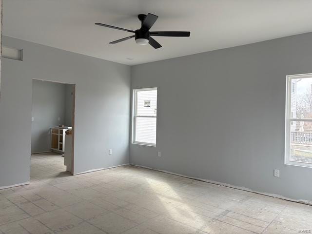 empty room featuring ceiling fan