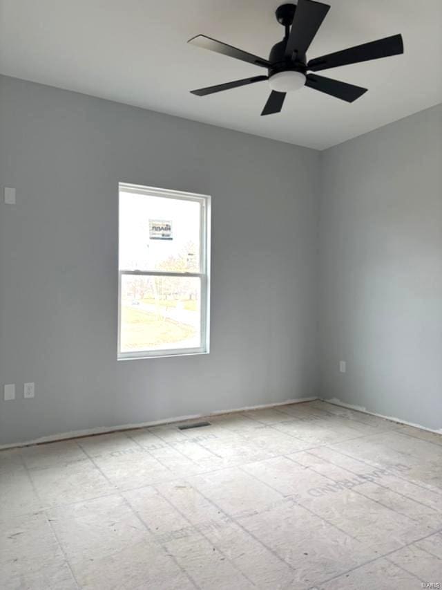 unfurnished room with ceiling fan