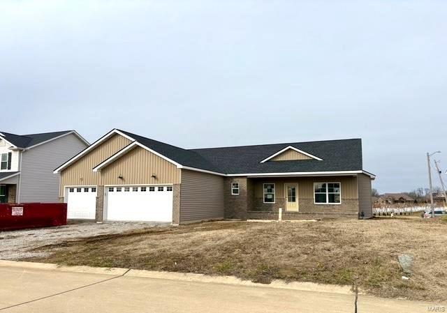 ranch-style home with a garage