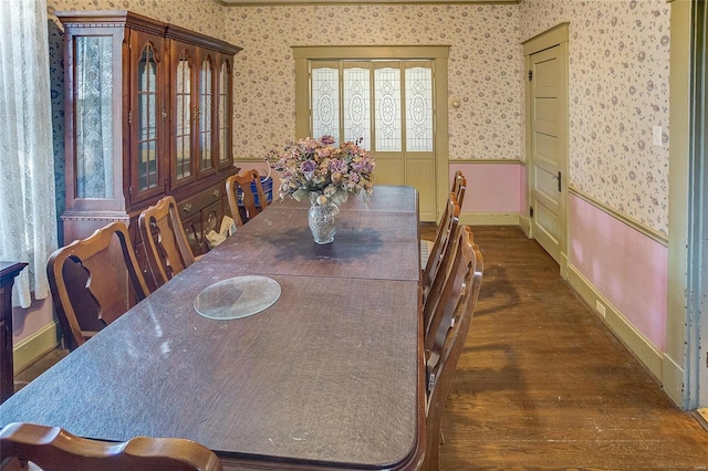 dining room with dark hardwood / wood-style floors