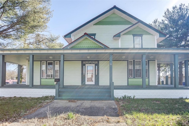 victorian-style house with covered porch