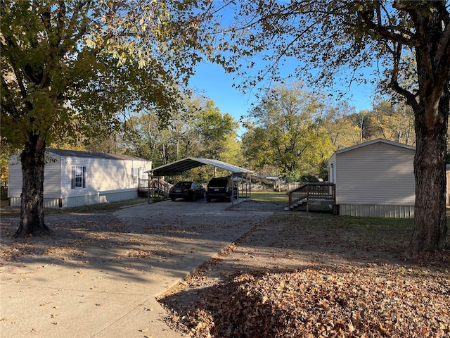 exterior space featuring a carport