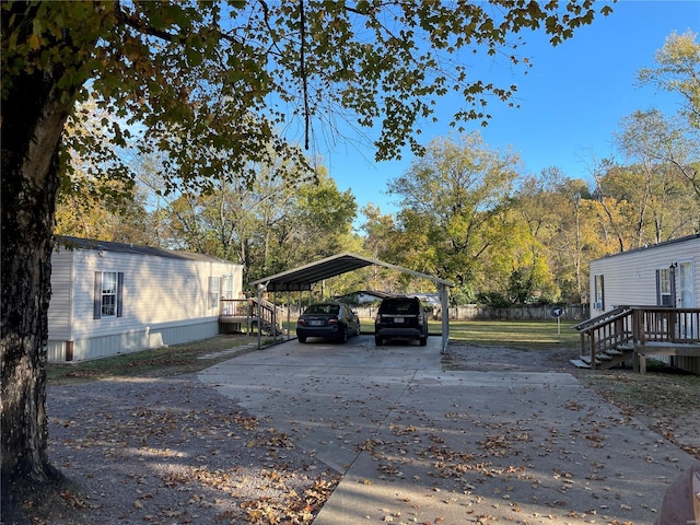 view of parking with a carport