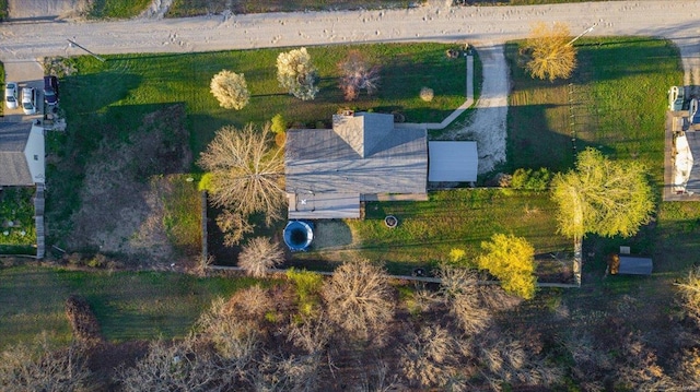 birds eye view of property with a rural view