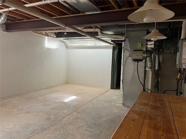 basement featuring water heater