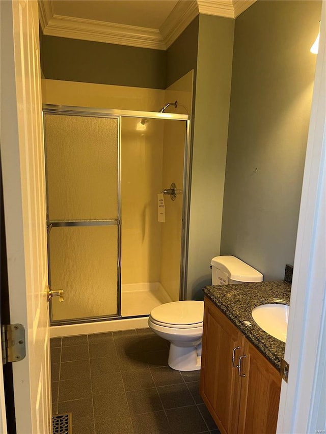 bathroom featuring toilet, tile flooring, ornamental molding, and vanity